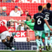 Manchester United’s Scottish midfielder #39 Scott McTominay (L) heads home their late winning goal during the English Premier League football match between Manchester United and Brentford at Old Trafford in Manchester, north west England, on October 7, 2023. (Photo by Darren Staples / AFP)