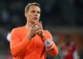 Bayern Munich’s German goalkeeper Manuel Neuer acknowledges the fans after the German first division Bundesliga football match between Borussia Moenchengladbach and FC Bayern Munich in Moenchengladbach, western Germany, on August 13, 2021. – The match ended in a 1-1 draw. (Photo by Ina Fassbender / AFP) /