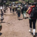 Residents of Bambo in Rutshuru territory, 60 kilometers north of Goma, the capital of North Kivu, eastern Democratic Republic of Congo, flee as the M23 attacked the town on October 26, 2023. – Around noon, M23 rebels, supported by the Rwandan army according to the UN, the USA and the European Union, attacked the town of Bambo with mortars, causing several thousand inhabitants to flee. (Photo by ALEXIS HUGUET / AFP)