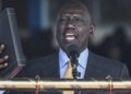 Kenya President William Ruto takes the oath of office at the Moi International Sports Center Kasarani in Nairobi, Kenya, on September 13, 2022 during the inauguration ceremony. – William Ruto was sworn in as Kenya’s fifth post-independence president at a pomp-filled ceremony on Tuesday, after his narrow victory in a bitterly fought but largely peaceful election.Tens of thousands of people joined regional heads of state at a packed stadium in Nairobi to watch him take the oath of office, with many spectators clad in the bright yellow of Ruto’s party and waving Kenyan flags. (Photo by SIMON MAINA / AFP)