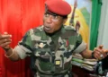 Guinea's former military ruler Moussa Dadis Camara speaks at his office at the Alpha Yaya Diallo camp in Conakry in 2009 [File: Seyllou/AFP]