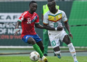 Senegal’s midfielder #10 Sadio Mane (R) fights for the ball with Gambia’s midfielder #24 Ebrima Darboe during the Africa Cup of Nations (CAN) 2024 group C football match between Senegal and Gambia at Stade Charles Konan Banny in Yamoussoukro on January 15, 2024. (Photo by Issouf SANOGO / AFP)