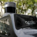 FILE PHOTO: The Apollo logo is seen on a car of Baidu's driverless robotaxi service Apollo Go, in Wuhan, Hubei province, China February 24, 2023. REUTERS/Josh Arslan/File Photo
