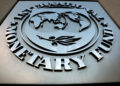 FILE PHOTO: The International Monetary Fund (IMF) logo is seen outside the headquarters building in Washington, U.S., September 4, 2018. REUTERS/Yuri Gripas/File Photo